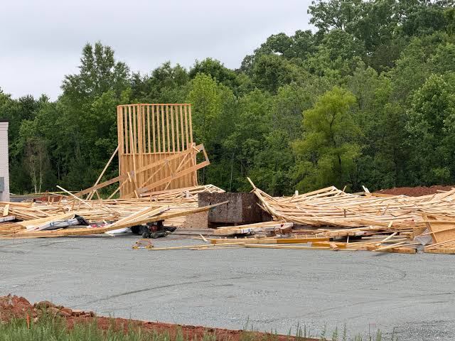 2 workers hurt in structure collapse on West Gate City Boulevard in Greensboro — collapsed wood framing at construction site