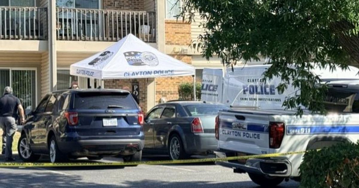 Son accused of stabbing, killing his 65-year-old mother in North Carolina — Clayton Police at Heritage Court Apartments crime scene